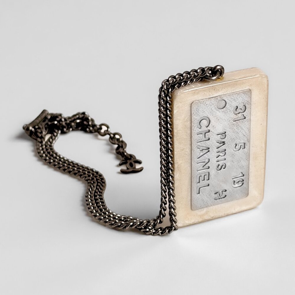 CHANEL dog tag necklace